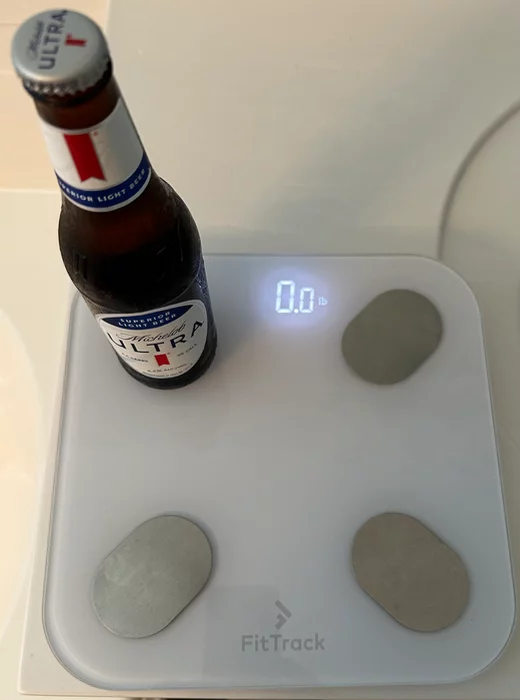 Michelin Ultra bottle sitting on a scale showing 0 lbs