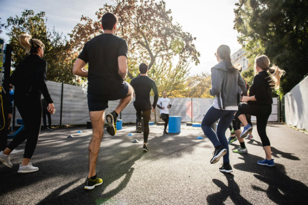 Group of people exercising in an outside workout class