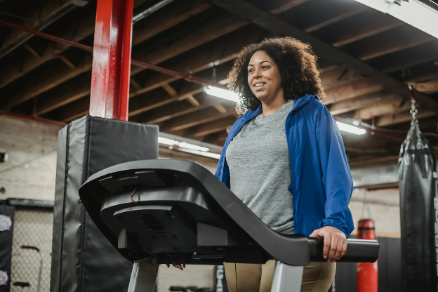 Lady on a treadmill smiling