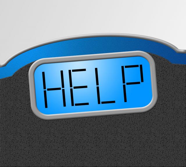 Weight loss scale indicating the word HELP in all capital letters.