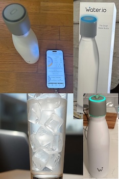Water io smart water bottle charging next to app on iphone