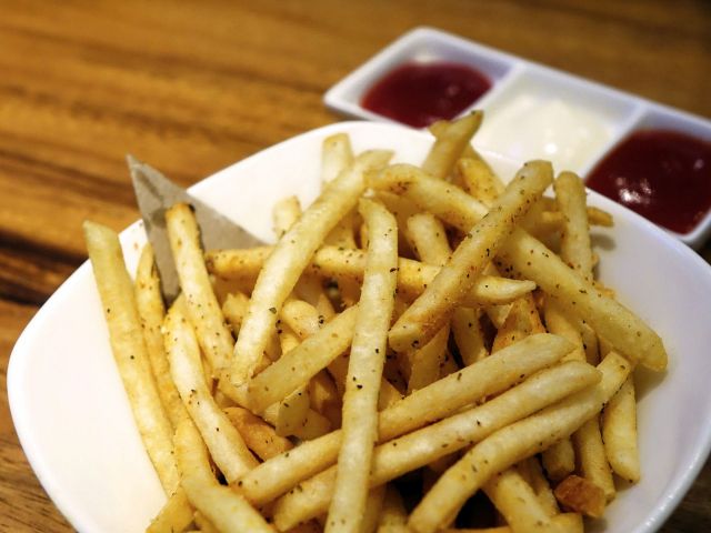 Plate of French Fries With Ketchup